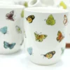 bG9jYWw6Ly9tZWRpYS85TS9HQy82MFIzMEMxRzZNVDNHQzlNLzYxZTAxNDkzLmpwZWc.webp Herbal Teapot Set - Butterflies