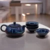 bG9jYWw6Ly9tZWRpYS85Ti9HRC82MFIzMEMxRzZXUzNHRDlOLzJhZmIxMmQ3LmpwZWc.webp Herbal Blues Teapot Set - Teapot and 4 Cups