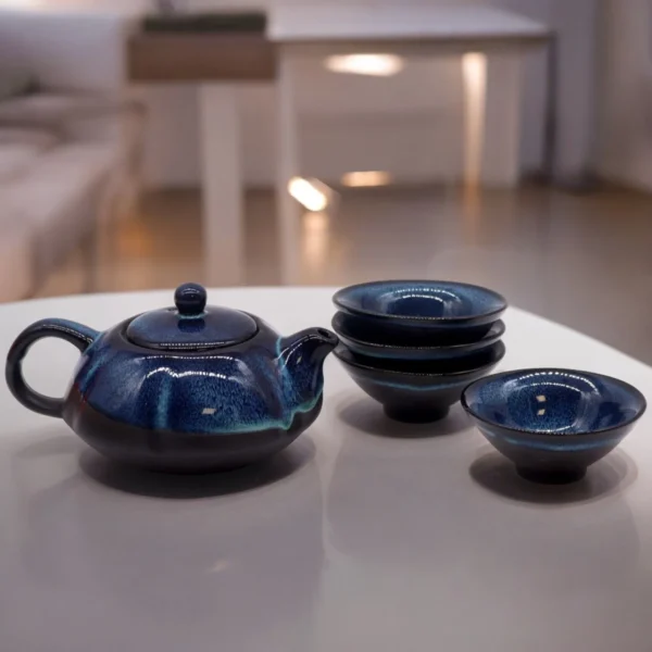 bG9jYWw6Ly9tZWRpYS85Ti9HRC82MFIzMEMxRzZXUzNHRDlOLzJhZmIxMmQ3LmpwZWc.webp Herbal Blues Teapot Set - Teapot and 4 Cups