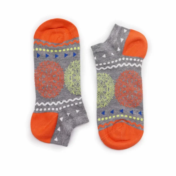 Womens low-cut grey cotton socks featuring colourful geometric patterns.