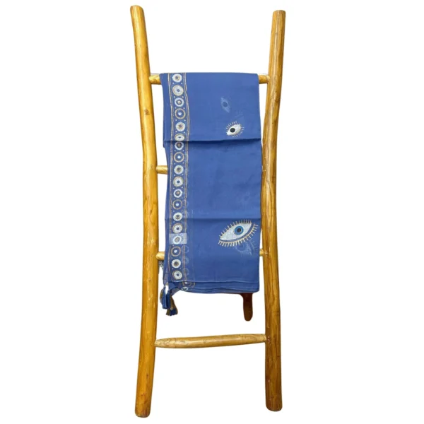 bG9jYWw6Ly9tZWRpYS85Ui9DRC82MFIzMEMxSDc0UzNDRDlSL2Y2ZjNlY2I3LmpwZWc.webp Nomad Sari On the Med Collection - Pareo - Rich Blue and Gold Hand Painted Evil Eye Design