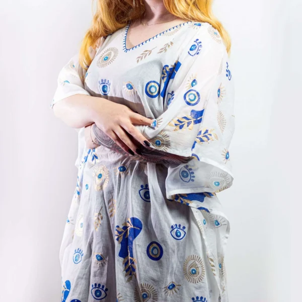 bG9jYWw6Ly9tZWRpYS9TRy9DRC82MFIzMEMxSDc0UzNDRFNHLzQxMDA2OTljLmpwZWc.webp Nomad Sari On the Med Collection - Kaftan - White , Blue and Gold Evil Eye Design