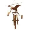 Handcrafted bamboo dragon wind chime with carved details and hanging tubular chimes.