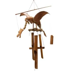 Handcrafted bamboo dragon wind chime with carved details and hanging tubular chimes.