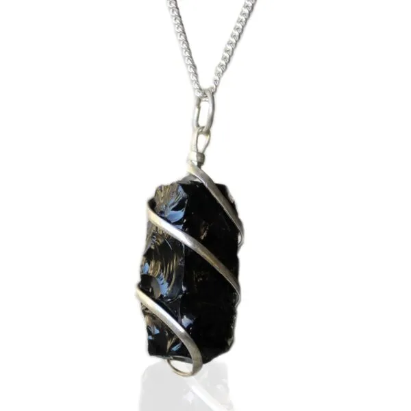 Handmade black obsidian pendant wrapped in silver wire on a sleek silver chain.