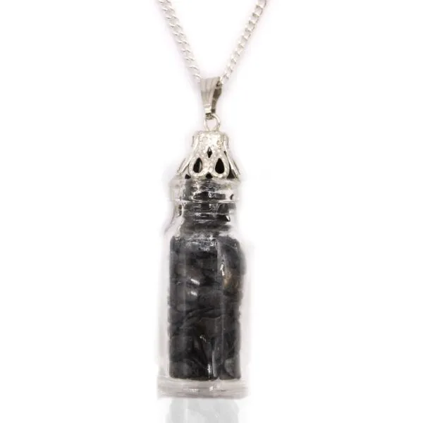 Silver glass vial necklace with glossy black stones and ornate cap, gothic jewellery charm.
