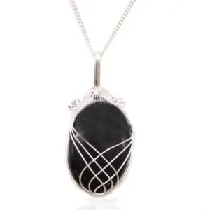 Handcrafted silver wire-wrapped necklace with polished oval black gemstone on a fine silver chain.