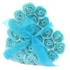 Heart-shaped gift box with blue soap roses and a sheer polka dot ribbon bow.