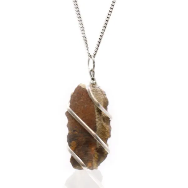 Raw brown jasper pendant wrapped in silver wire on an elegant silver chain.