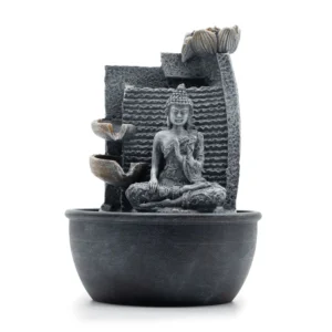 Stone-effect grey Buddha meditation fountain with lotus flower and cascading water bowls for tranquillity.