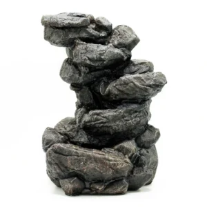 Stacked dark grey stone sculpture with rugged texture on a white background.