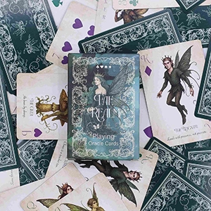 Fantasy fairy oracle playing cards with ornate green box and enchanting fae illustrations.