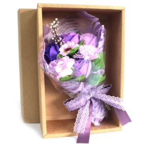 Elegant purple and white artificial soap flower bouquet in a brown Kraft gift box.