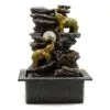 Elephant Tabletop Fountain Resin Sculpture Gold - Crystal Orb Golden elephant tabletop fountain with crystal orb, rocky design, and rotating water wheel.