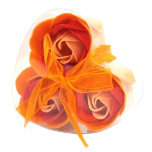 Heart-shaped clear box with orange soap roses and sheer organza ribbon bow gift.