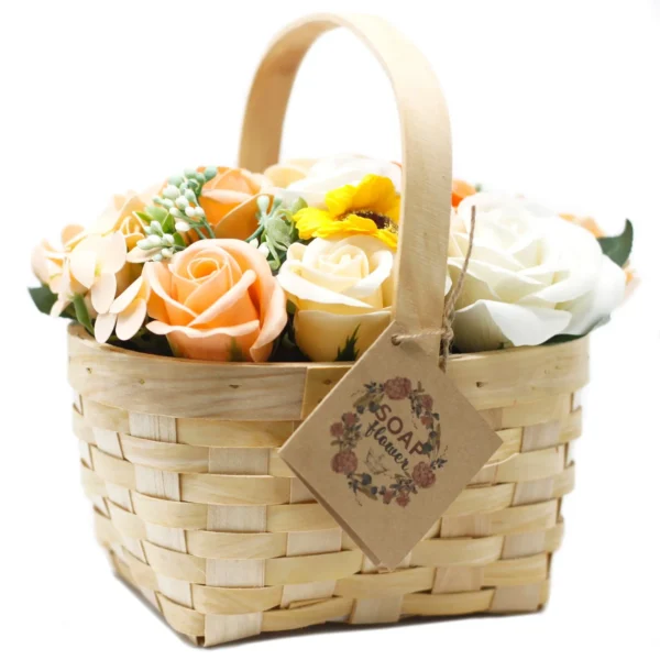 Pastel soap flower basket with peach roses and sunflower in a rustic woven wood design.