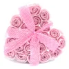 Heart-shaped clear box with pink soap roses and a sheer pink polka-dot ribbon.