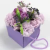 Purple Artificial Flower Bouquet Gift Box - Elegant Arrangement A purple artificial flower bouquet with roses and carnations in a square lavender gift box.