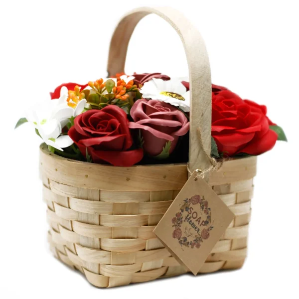 Rustic woven basket filled with red, mauve, and white soap flowers for elegant home décor.