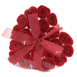 Heart-shaped clear box with red soap roses and sheer red polka dot ribbon bow.