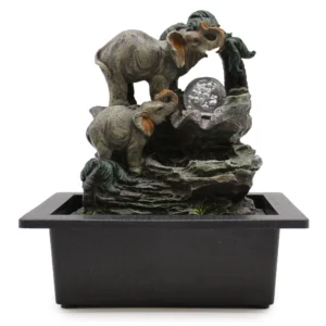 Grey resin elephant tabletop fountain with crystal ball and cascading water feature.