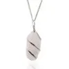 Elegant rose quartz pendant wrapped in silver wire on a delicate polished silver chain.