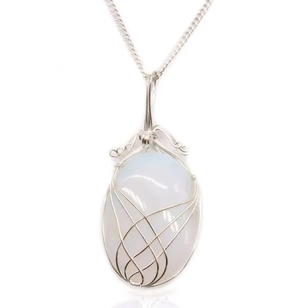 Moonstone Pendant Necklace Silver Wire Wrapped Iridescent Glow Elegant silver wire-wrapped moonstone pendant necklace with iridescent glow on a delicate chain.