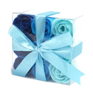 Blue Soap Rose Gift Box - Elegant Ribbon & Gradient Design A clear gift box filled with blue rose-shaped soap flowers tied with a light blue satin ribbon.