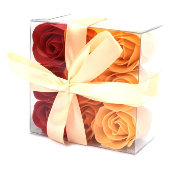 Red and orange soap rose gift box with cream satin ribbon, perfect for romantic gifting.