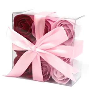 Red Soap Rose Gift Box - Clear Acrylic Case With Ribbon Elegant clear acrylic gift box with red and pink soap roses tied by a pale pink ribbon.