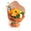 Sunflower and rose soap flower bouquet wrapped in orange mesh with raffia bow and brown tag.