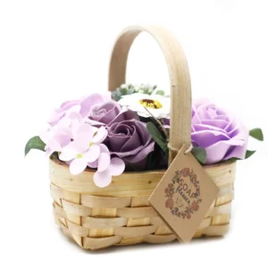 Handmade lilac and white soap flower basket with roses in a rustic woven design.