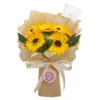 Yellow sunflower soap flower bouquet wrapped in beige paper with a gold ribbon and card.