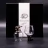 Pair of bronze dragon-themed antique glasses with black gift box labelled “Mystical Creatures.”