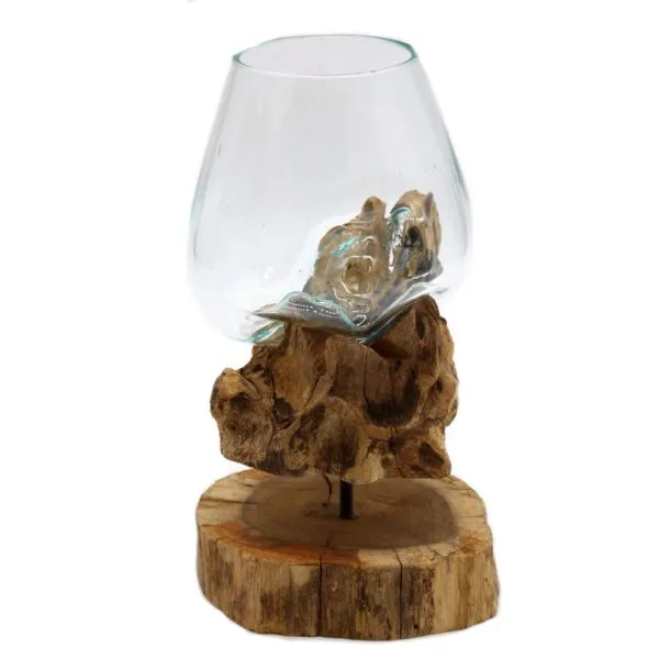 Hand-blown glass bowl fused onto natural driftwood base, rustic decorative art piece.