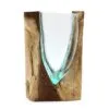 Hand-blown glass bowl fused with rustic natural wood base in an artistic decorative vessel.