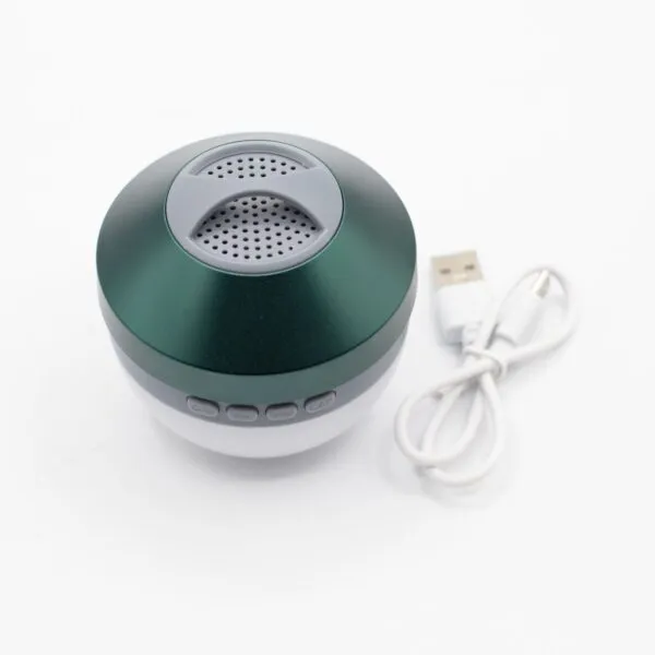 A small green and white spherical portable wireless speaker with control buttons and a charging cable.