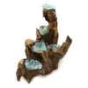 Molten glass bowls fused with twisted driftwood sculpture resembling a cascading natural waterfall.