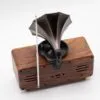 Retro Wooden Bluetooth Speaker Brown - Brass Gramophone Horn Vintage-style wooden Bluetooth speaker with a brass gramophone horn and modern input ports.
