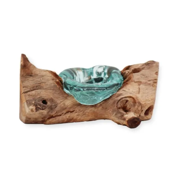 A handcrafted aqua glass bowl fused to natural driftwood base, rustic decorative home art piece.