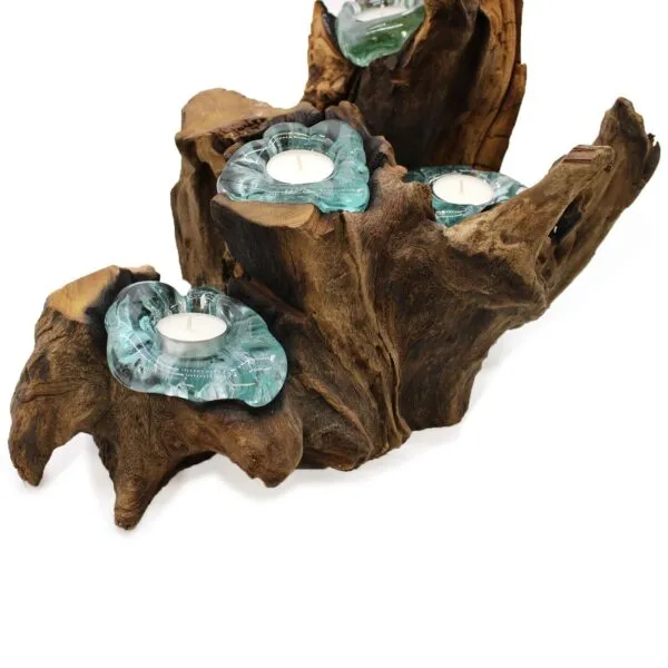 Handcrafted driftwood candle holder with aquamarine glass cups and white tealight candles.