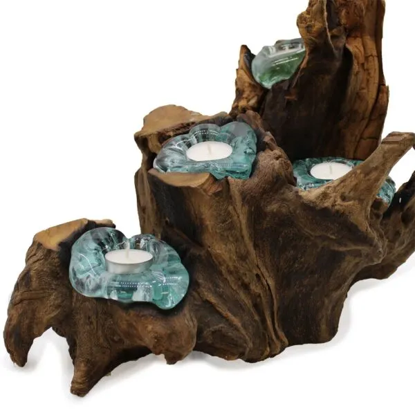 Molten glass tealight holders on natural driftwood base, showcasing rustic and artistic home décor craftsmanship.