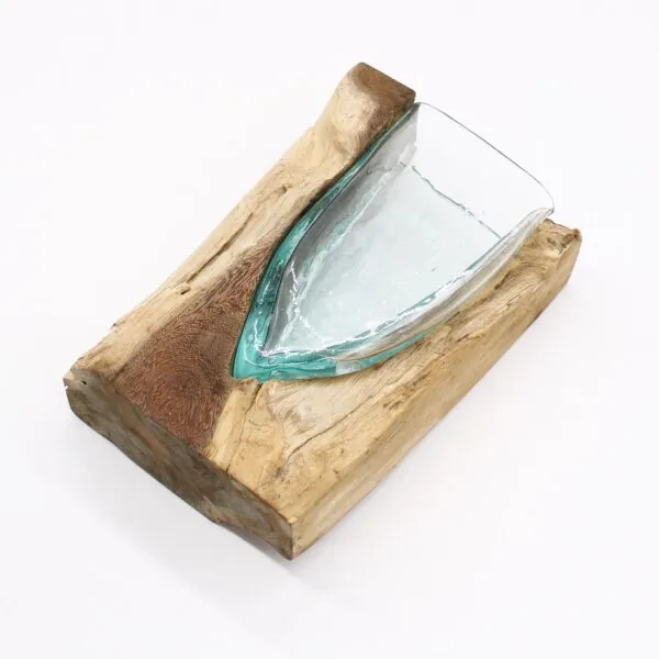 Wood and glass sculptural bowl combining natural timber base with a clear green-tinted glass vessel.