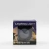 Camping light and speaker box with camping scene design and transparent window showing the device