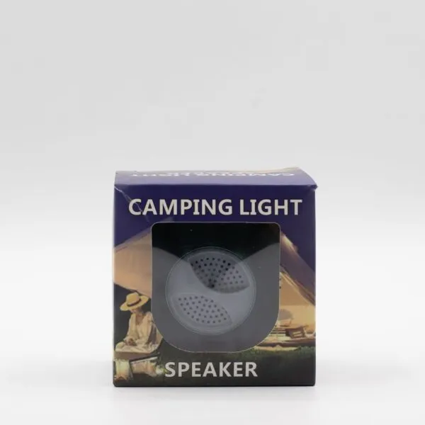 Camping light and speaker box with camping scene design and transparent window showing the device