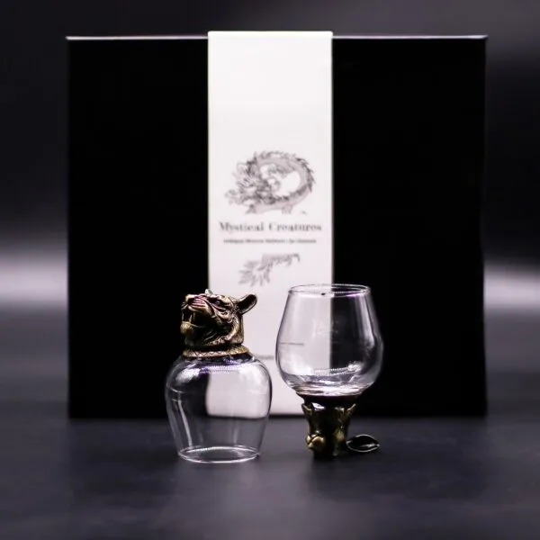 Two vintage-style bronze animal base glasses with black gift box labelled “Mystical Creatures”.