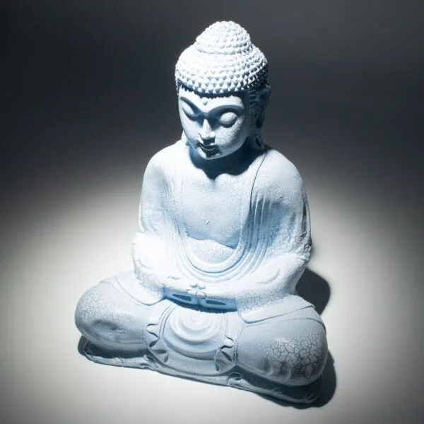 Buddha Statue Ceramic Light Blue - Meditative Dhyana Mudra Light blue Buddha statue in meditation pose under soft lighting, symbolising peace and enlightenment.