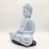 Buddha Statue Ceramic Light Blue - Crackled Glaze Meditation Pose A light blue crackled Buddha statue seated in lotus position on a black base against a white background.