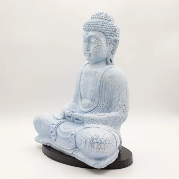 Buddha Statue Ceramic Light Blue - Crackled Glaze Meditation Pose A light blue crackled Buddha statue seated in lotus position on a black base against a white background.
