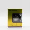 Gold and purple mini speaker box with visible black circular speaker and silver grille.